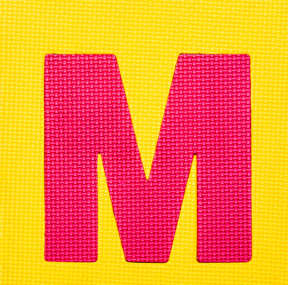 letter 'M' on yellow background